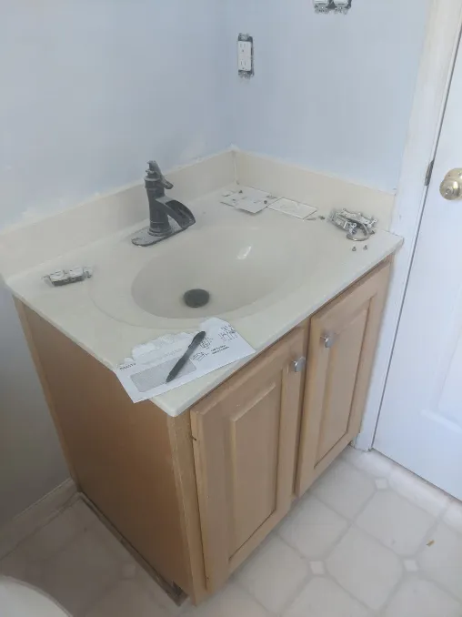 A giant vanity in a tiny corner