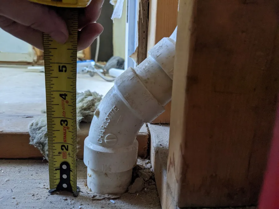 a pipe sticks out of a wall by about 5 inches