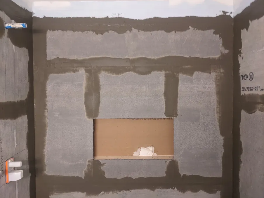 Concrete is used to seal the cracks between cement boards