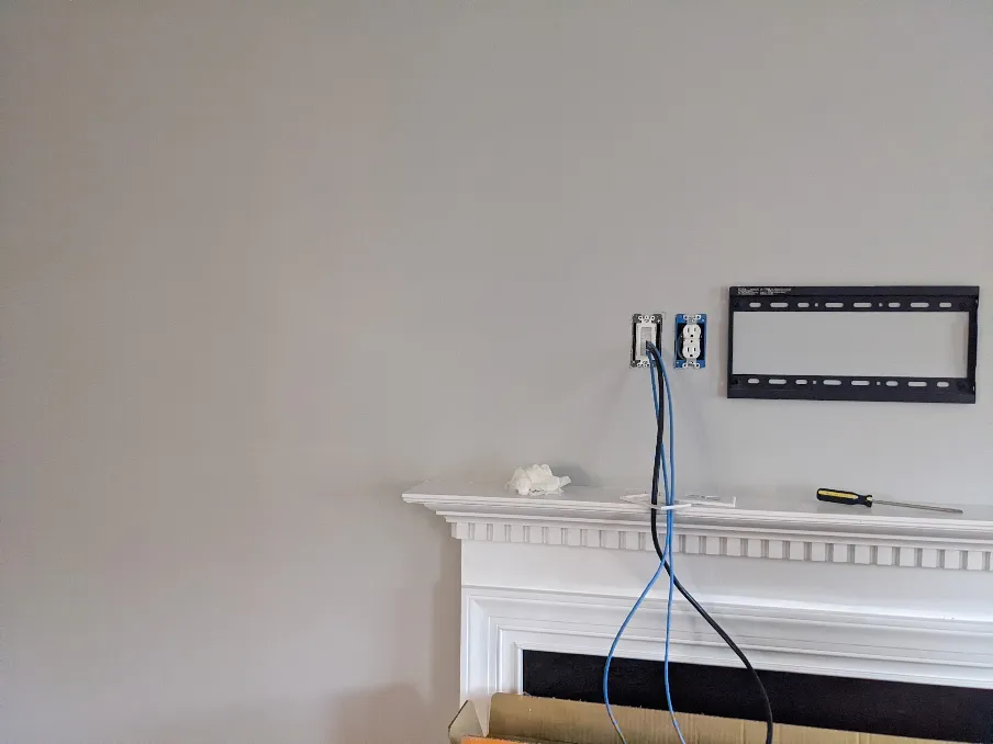 The wall has been cleaned up and painted. There is no evidence that the hole was ever there